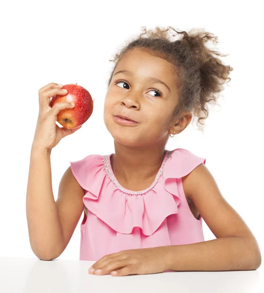 Portrait of a pretty little girl with a red apple — Stock Photo, Image