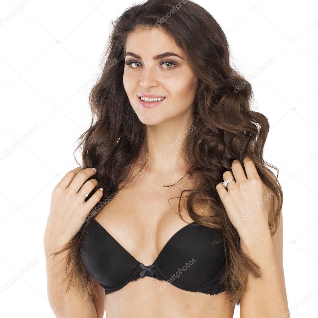 Young sexy brunette woman in black bra
