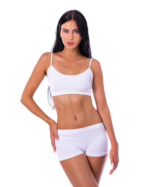 Femme sexy en vêtements de fitness blanc — Photo