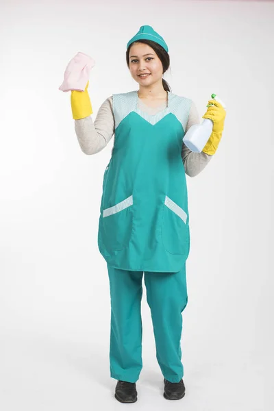 Full length photo of young brunette mais in uniform and yellow p — Stock Photo, Image