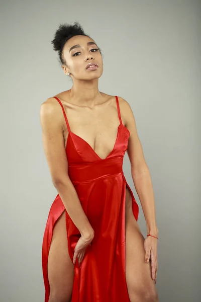 Portrait of sensual young african woman in red dress — Stock Photo, Image