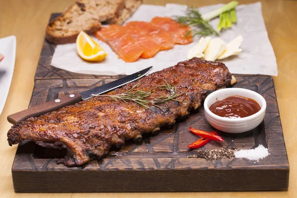 Closeup of pork ribs grilled with BBQ sauce — Stock Photo, Image