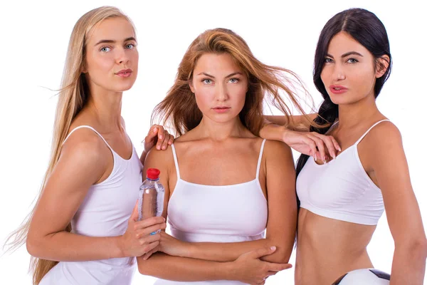 Fitness women. Young beautiful girlfriends in white sportswear — Stock Photo, Image