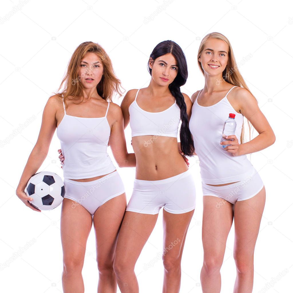 Fitness women. Young beautiful girlfriends in white sportswear
