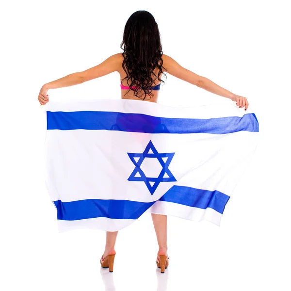 Młoda piękna brunetka Kobieta w bikini trzyma o jasne flaga — Zdjęcie stockowe