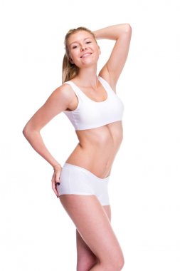 genç güzel sarışın kadın beyaz fitness giyim