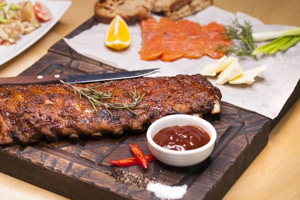 Closeup of pork ribs grilled with BBQ sauce — Stock Photo, Image