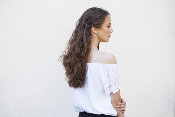 Portrait close up of young beautiful brunette woman — Stock Photo, Image