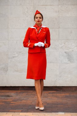 RUSSIA, SAMARA: 08 AUGUST 2019. Sexy stewardess dressed in offic