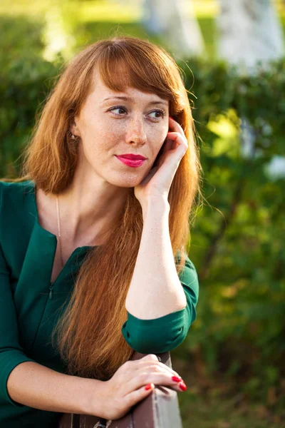 Portrait of a young red-haired girl with freckles — Stock Photo, Image