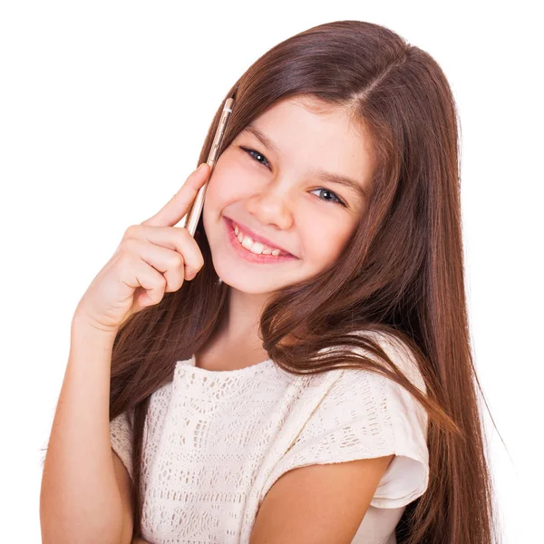 Young beautiful girl is calling on a smartphone — Stock Photo, Image