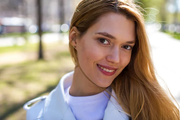 Portrait close up of young beautiful blonde woman — Stock Photo, Image