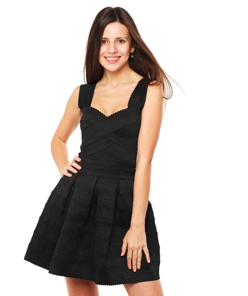 Jonge mooie brunette vrouw in zwarte jurk — Stockfoto