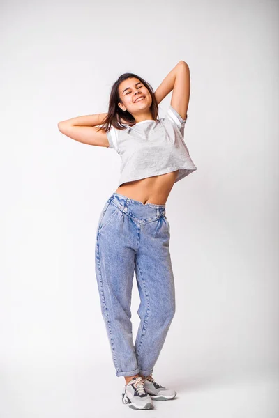 Vacker flicka i blå jeans — Stockfoto