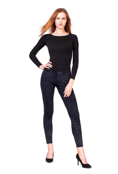 Mooie sexy vrouw in zwarte jeans — Stockfoto