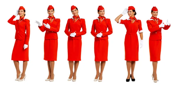 Giovane bella hostess russa in uniforme rossa — Foto Stock