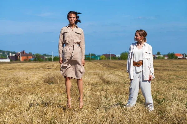 Two Beautiful Models Beige Suit Posing Background Wheat Cut Field — Stock Photo, Image