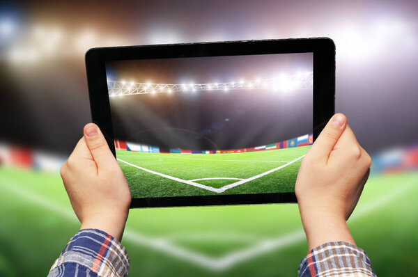 tablet with clean white screen in hands