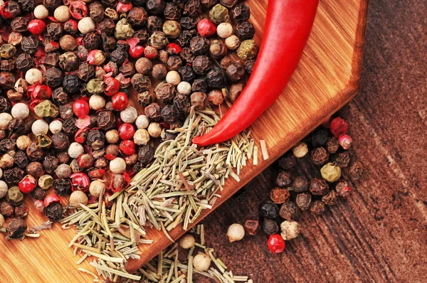 Hot pepper with peppercorns — Stock Photo, Image