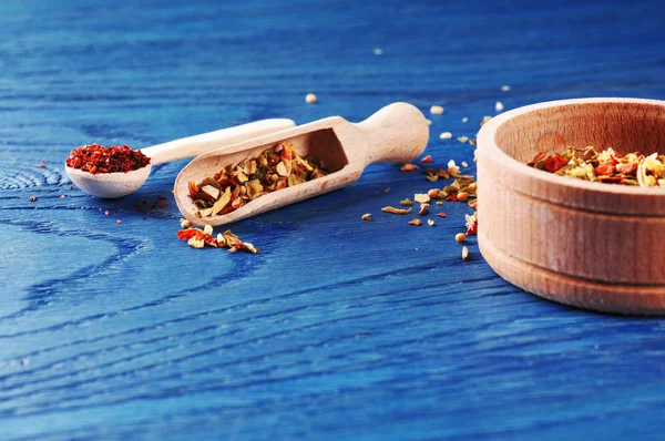 Different Dry Spices Wooden Bowl Spoons Dark Blue Background — Stock Photo, Image