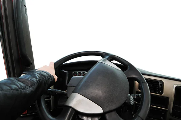 Truck dashboard with drivers hand on the steering wheel against isolated on a white background