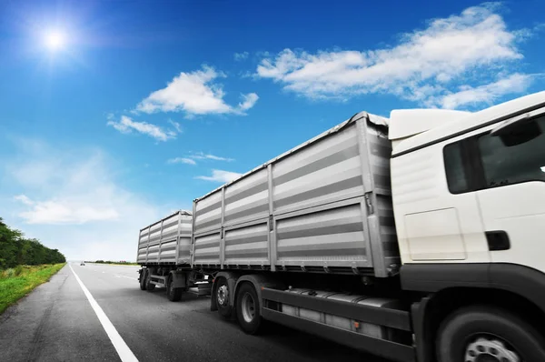 White Truck Grey Trailer Driving Countryside Road Blue Sky White — Stock Photo, Image