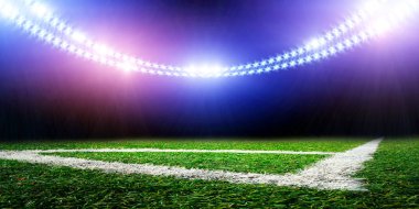 Parlak ışıkları olan futbol stadyumu 