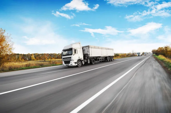 Big Trucks Motion White Trailers Cars Countryside Road Blue Sky — Stock Photo, Image