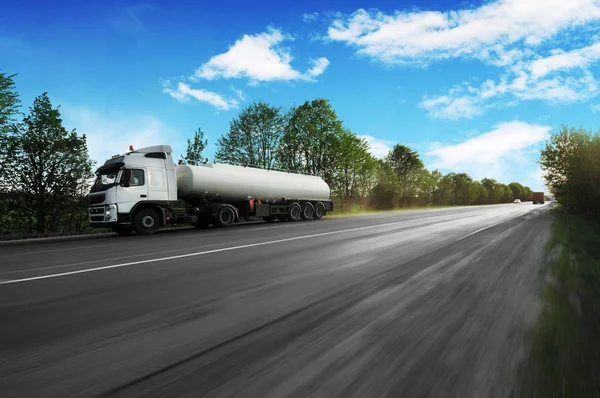 Big Metal Fuel Tanker Truck Shipping Fuel Countryside Road Motion Royalty Free Stock Images