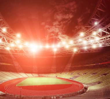 Yeşil çim ve ışıklar ile futbol sahası
