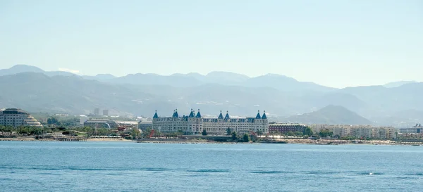 Hotels by the sea on a sunny day. View from the sea. Turkey.