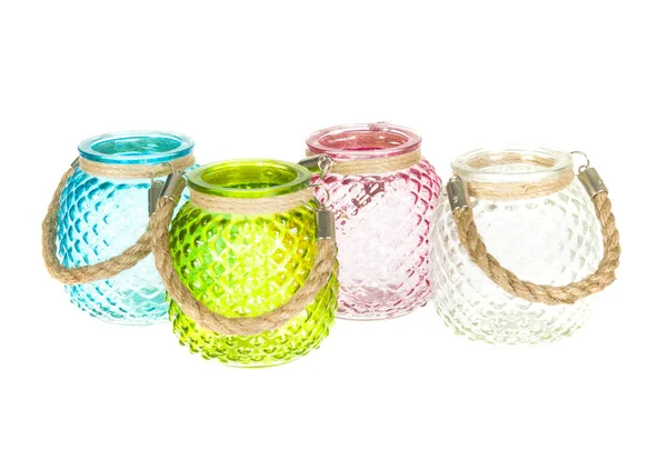 Small multi-colored glass jars — Stock Photo, Image