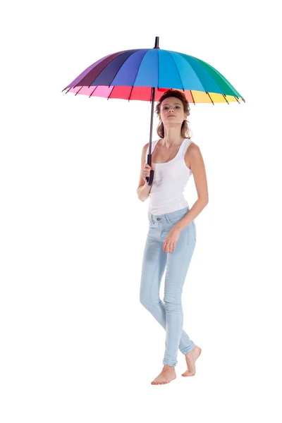Menina bonita posando com guarda-chuva de cor no fundo branco — Fotografia de Stock