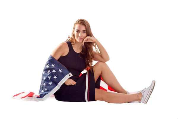 Glückliche patriotische Frau mit US-Fahne. — Stockfoto