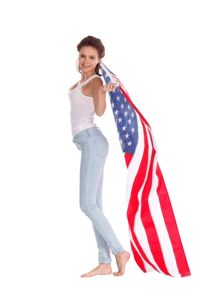 Bandeira dos Estados Unidos da América em mãos de mulher bonita. É — Fotografia de Stock