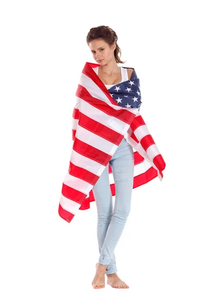 Bandera de los Estados Unidos de América en manos de una mujer hermosa. Es —  Fotos de Stock
