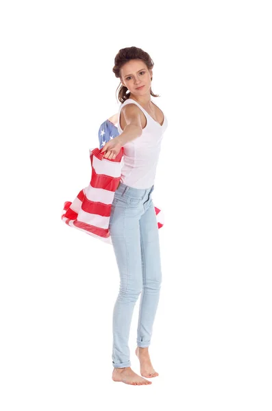 Bandera de los Estados Unidos de América en manos de una mujer hermosa. Es — Foto de Stock