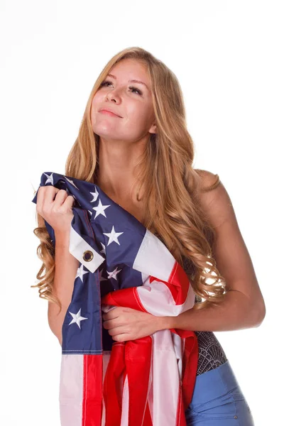 Bandera de Estados Unidos de América en manos de una mujer hermosa . — Foto de Stock