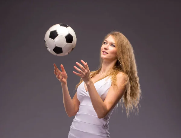 Young Woman In White Evening Dress with soccer ball — Stock Photo, Image