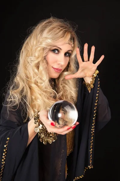 Crystal ball and fortune teller hands. — Stock Photo, Image