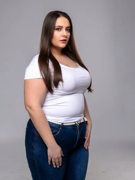 Plus Size Model with long hair in studio — Stock Photo, Image