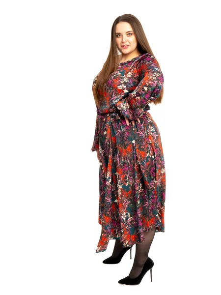 Plus Size Model with long hair posing in studio — Stock Photo, Image