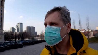 Sick man take off medical mask