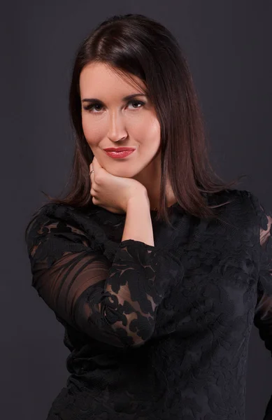 Attractive woman posing in evening dress — Stock Photo, Image