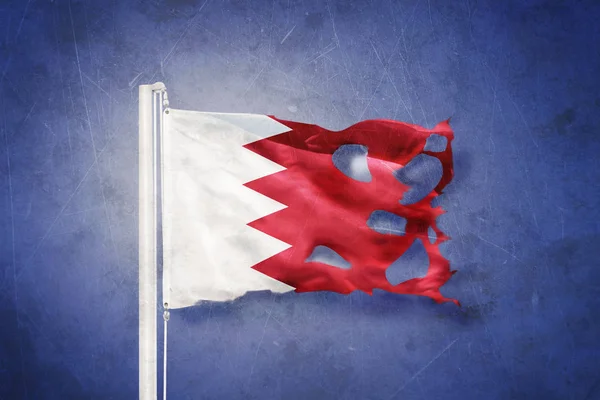 Flag of Bahrain flying against grunge background — Stock Photo, Image