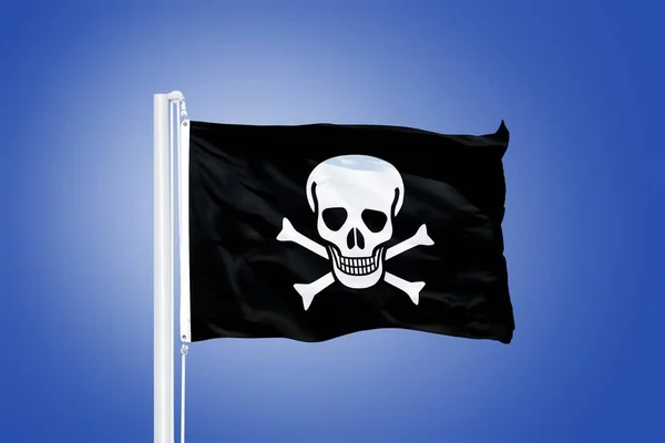 Jolly Roger Pirata bandeira soprando no vento — Fotografia de Stock