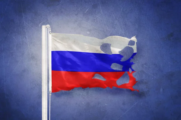 Torn flag of RUSSIA flying against grunge background — Stock Photo, Image