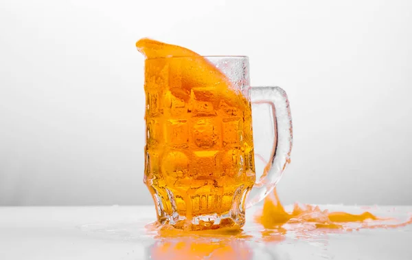 Glass of fresh beer on white background — Stock Photo, Image