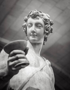 Dionysus Bacchus Wine statue portrait in Louvre clipart