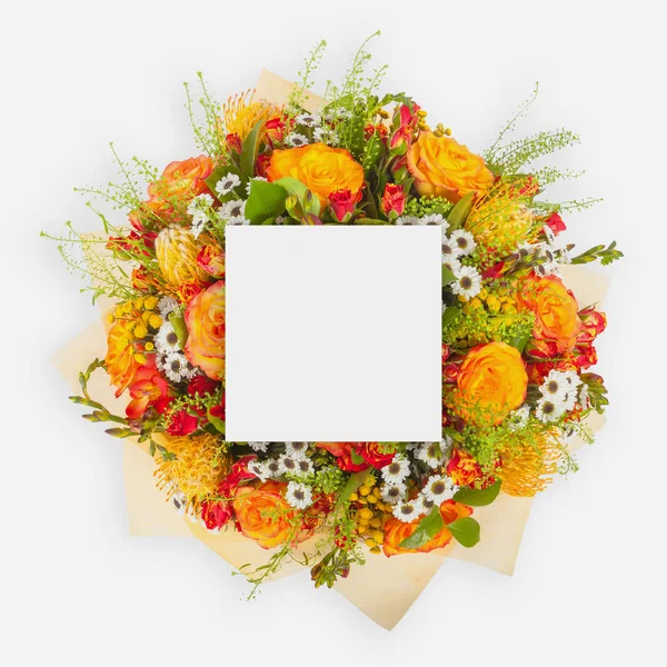 Creative layout with colorful flowers, leaves and copy space card note. Flat lay. — Stock Photo, Image